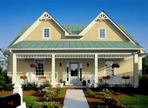 green siding house with metal roof|forest green corrugated metal roofing.